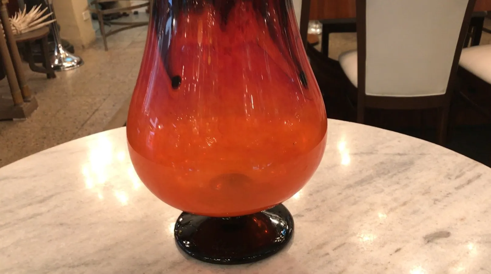 antique glass signed by Schneider in amber color