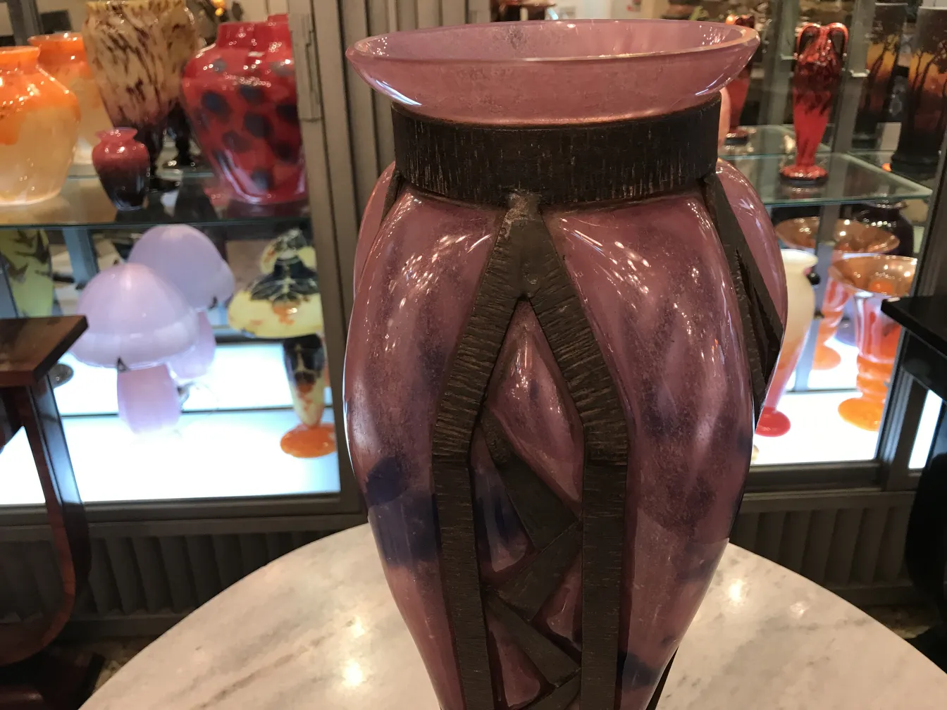 antique vase with purple and black design