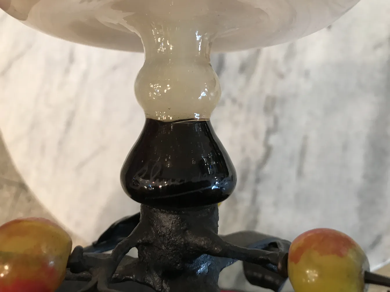 antique signed glass by Schneider featuring colorful details