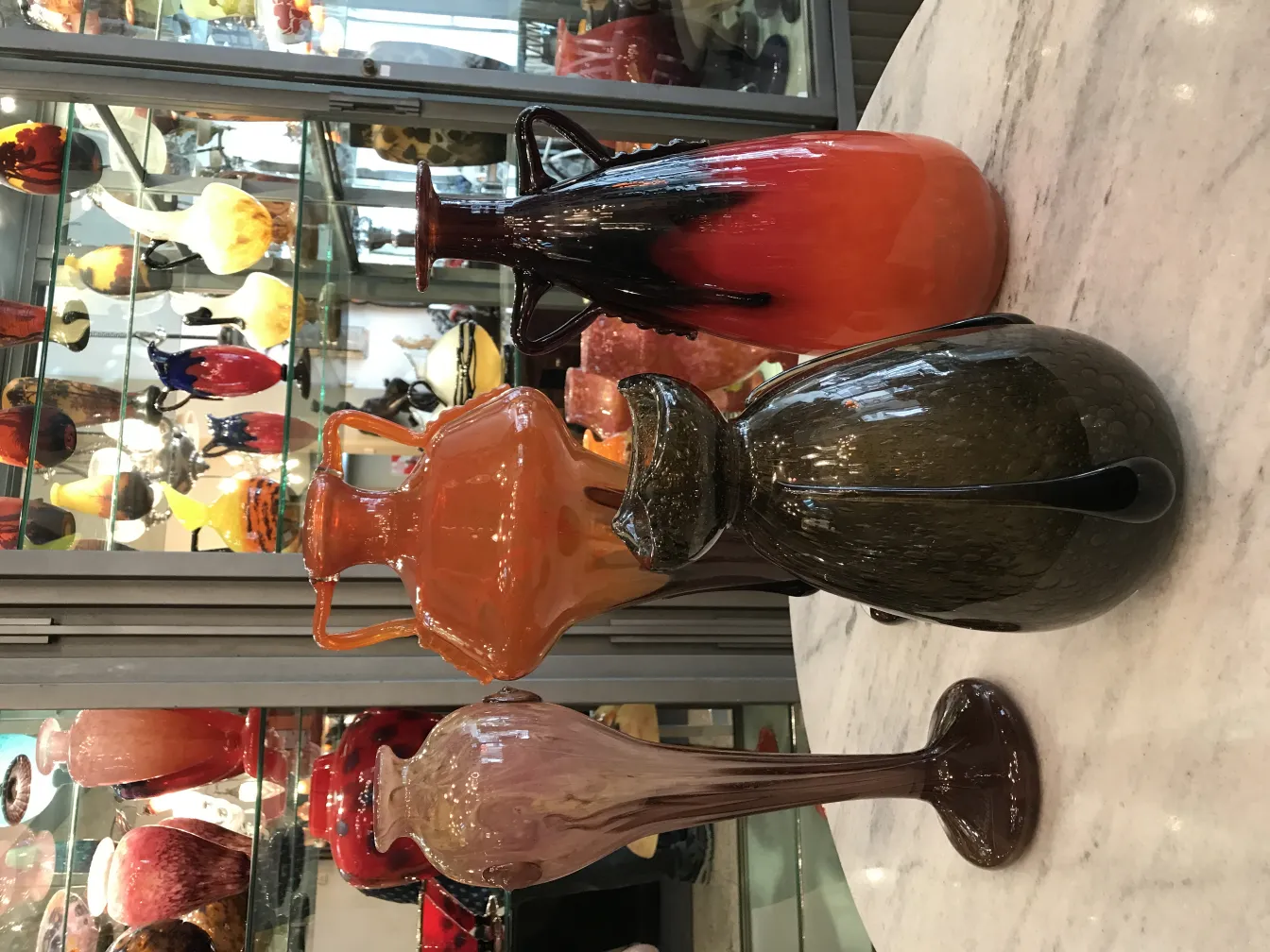 Dark signed glass Schneider in a vintage setting