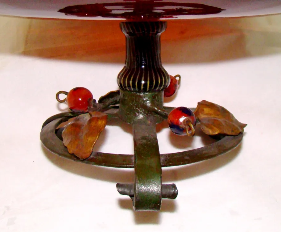 Signed glass Schneider with antique base decoration.