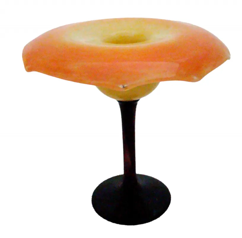 decorative glass in orange hue with a base