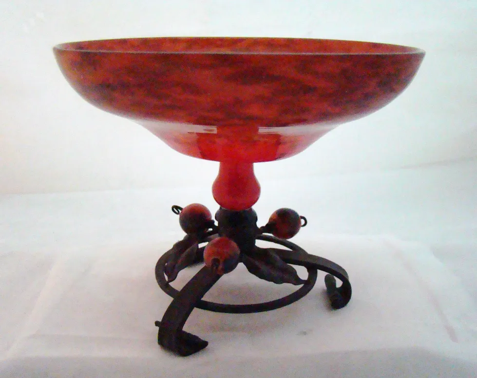 elegant signed glass by schneider on black stand