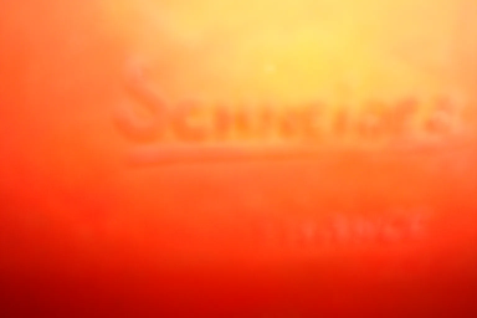 Signed glass marked Schneider on colorful background