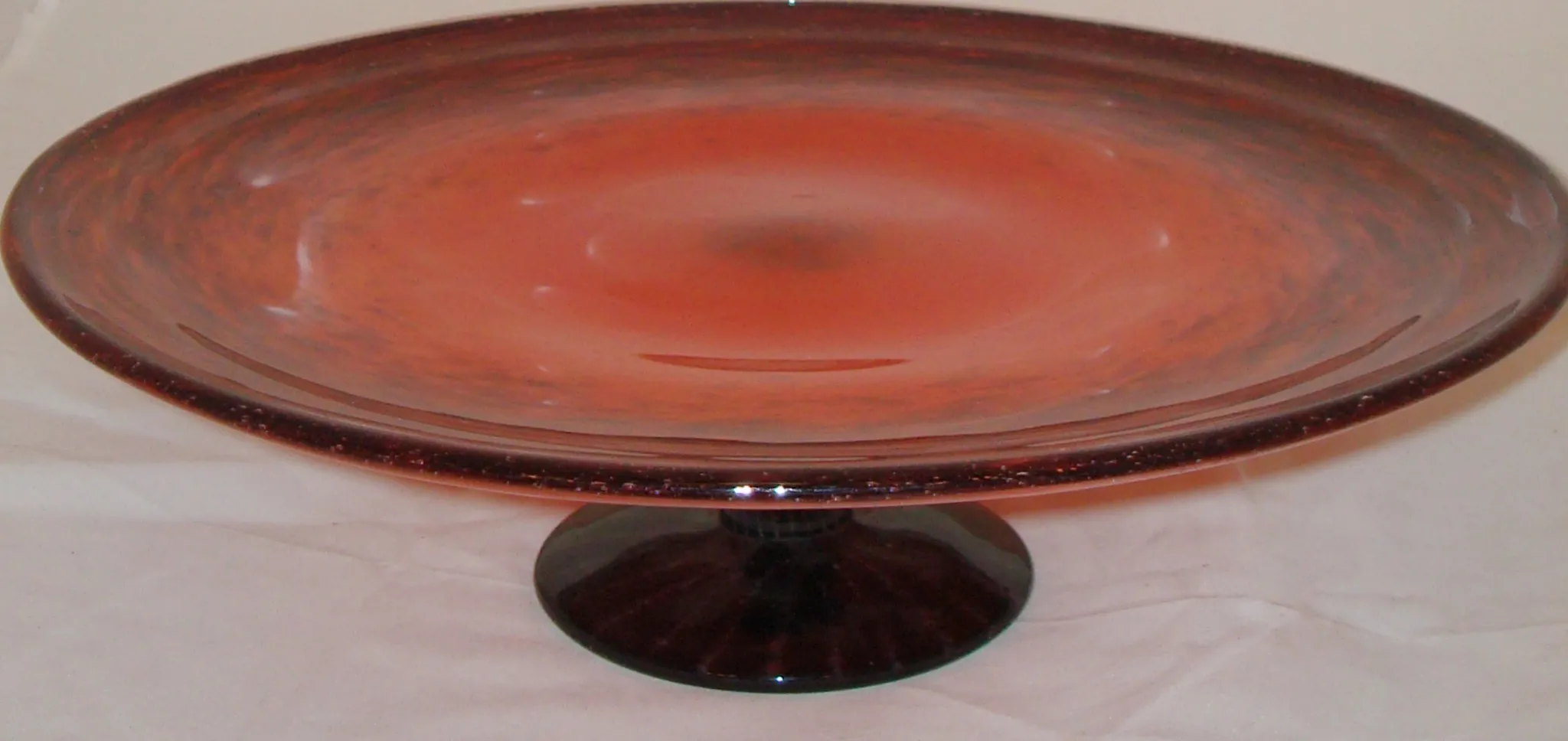 SIGNED GLASS by Schneider with a dark red base