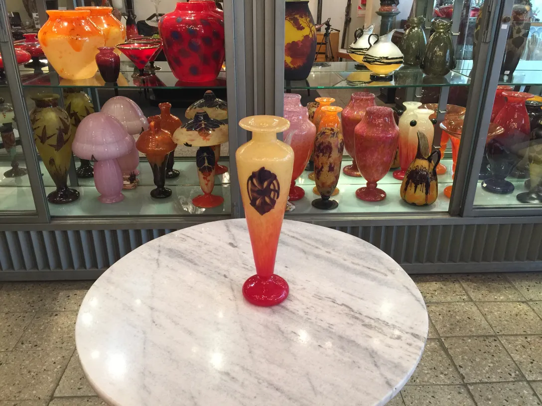 SIGNED GLASS Schneider in an antique setting with other items