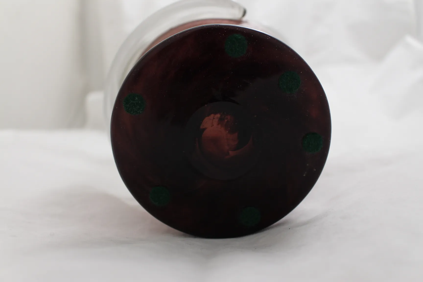 Base of signed glass by Schneider with dark colors