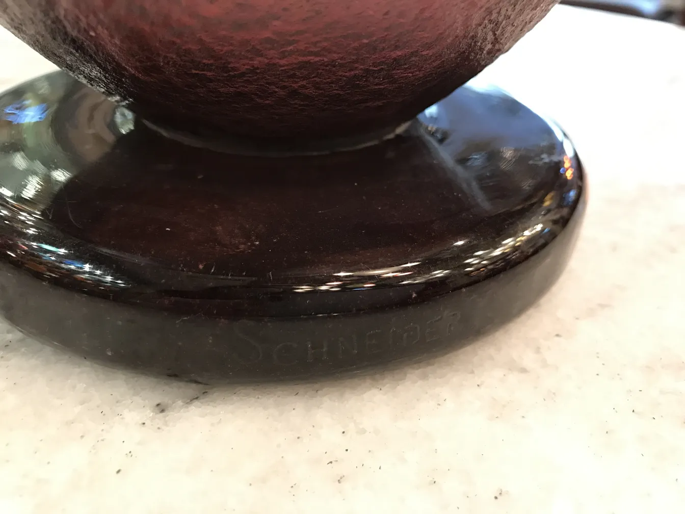 signed glass base of the antique schneider piece
