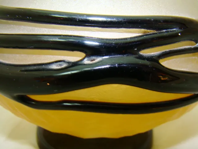 Antique signed glass by Schneider, featuring black patterns