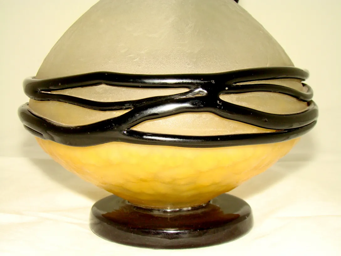 Schneider signed glass with delicate black detailing and vibrant colors