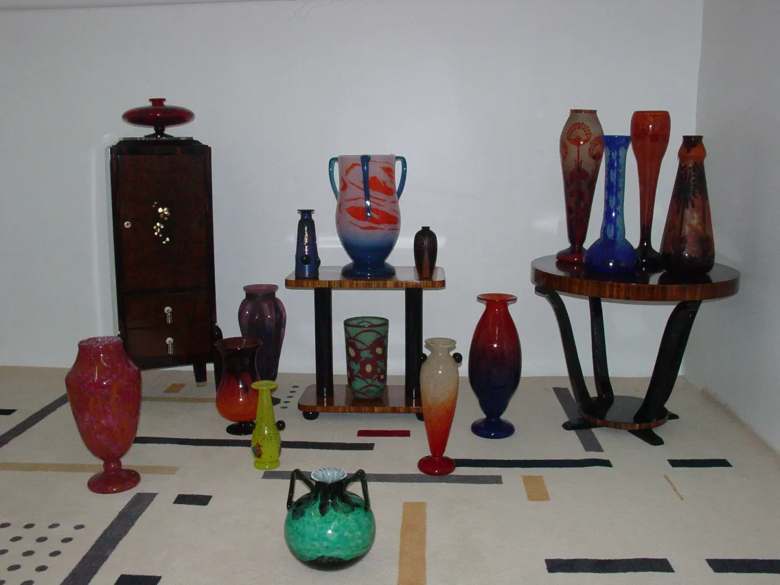 Various antique signed glass vases in different colors and shapes