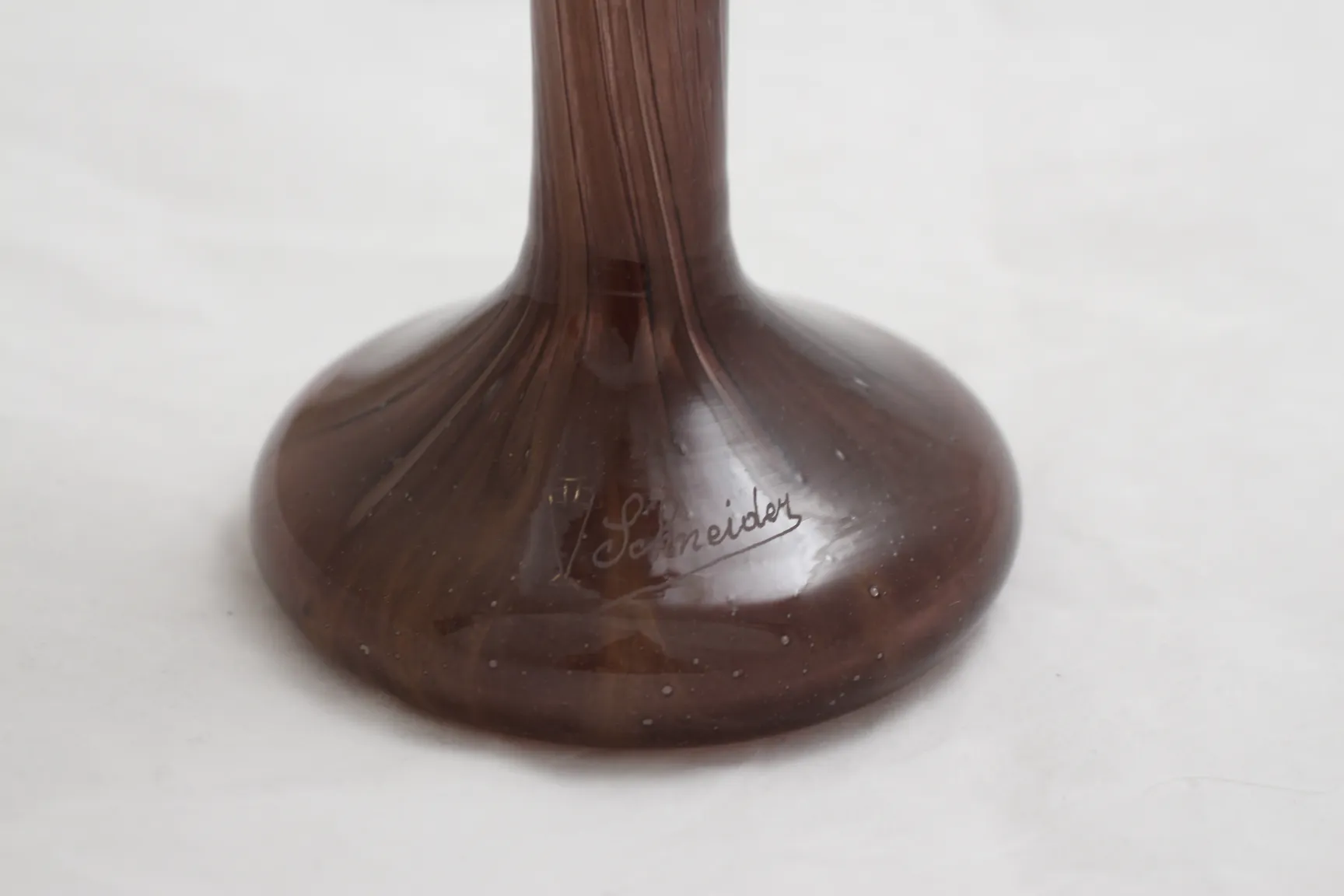 Antique glass featuring Schneider's signature in French style.