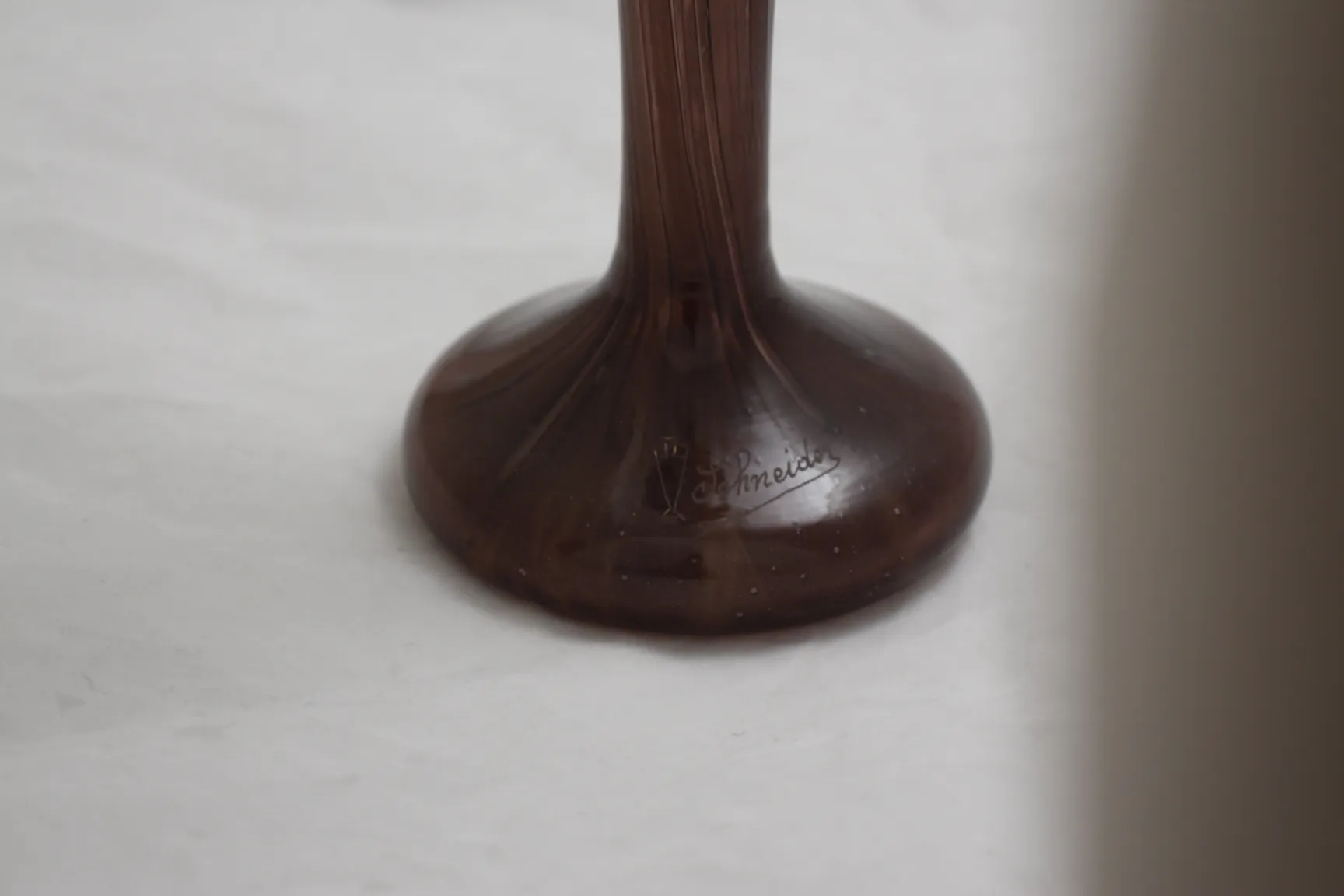 Antique signed glass by Schneider with elegant base.