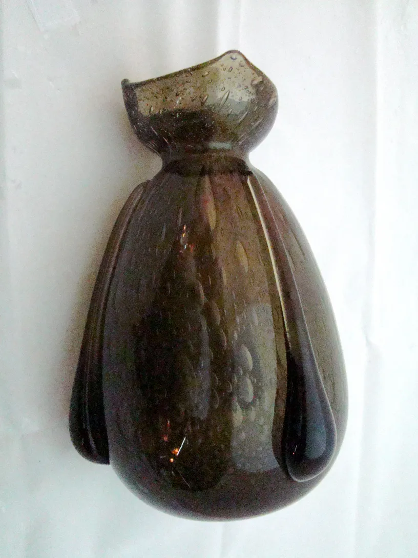 Antique signed glass Schneider with elegant shape and decorative bubbles.