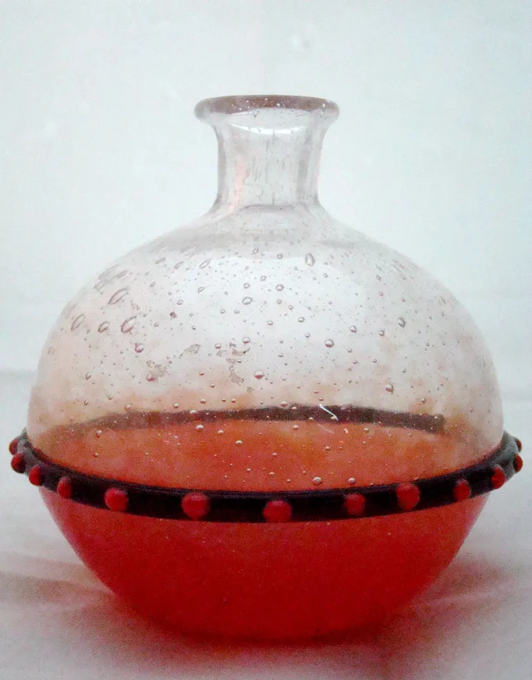 antique glass with unique design, visible bubbles, Schneider figure