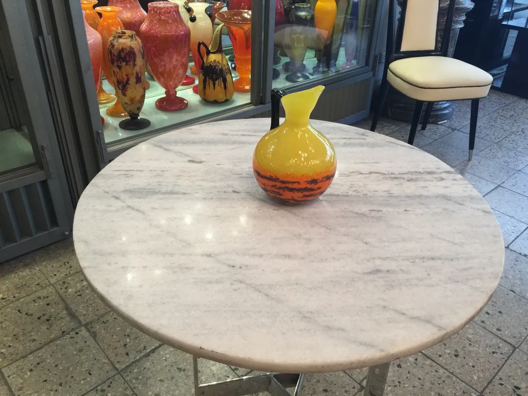 Yellow and orange signed vase by Schneider on table