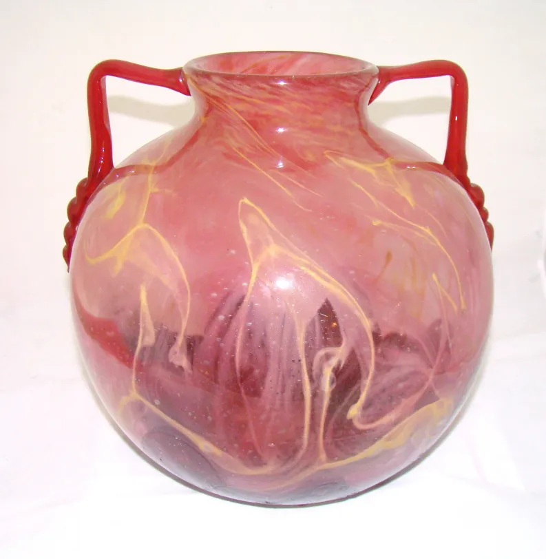 jar with signed Schneider glass featuring decorative pattern