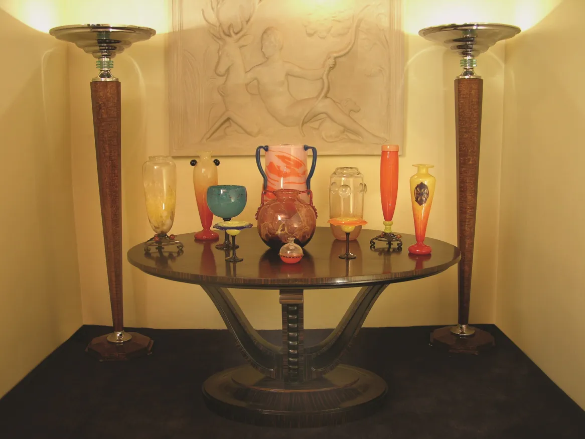 antique decorative signed glass schneider on a table