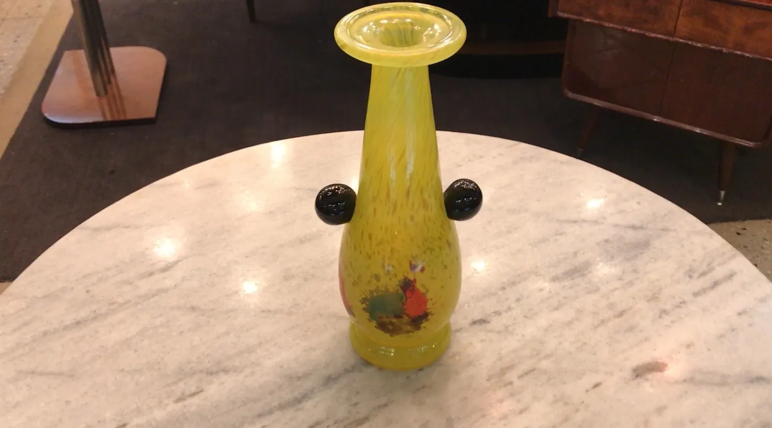 yellow vase with colorful details in design, antique