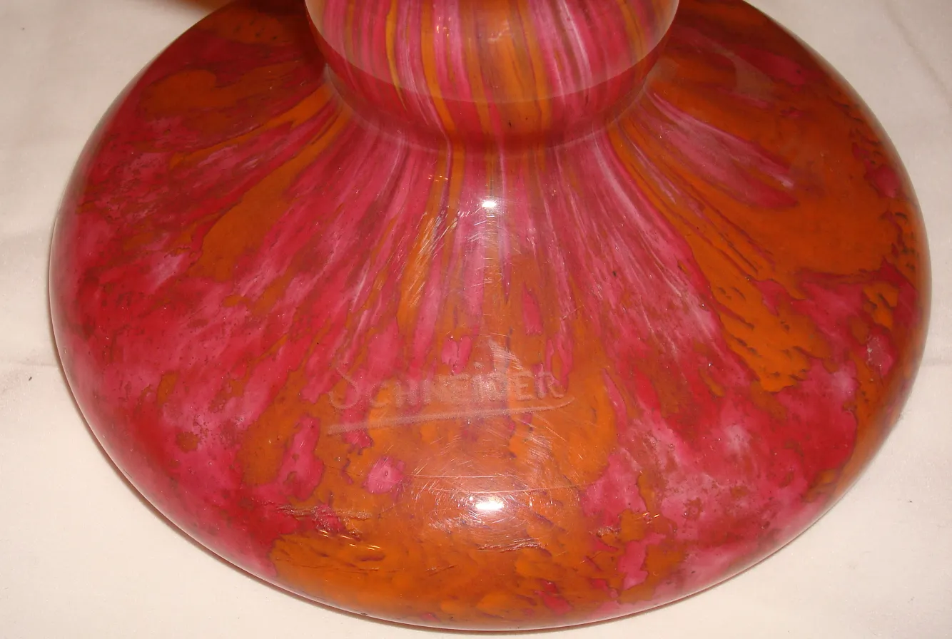 antique glass with visible Schneider signature in pink and orange