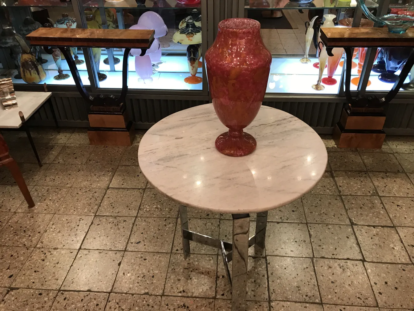 Colorful signed glass vase with a glossy finish