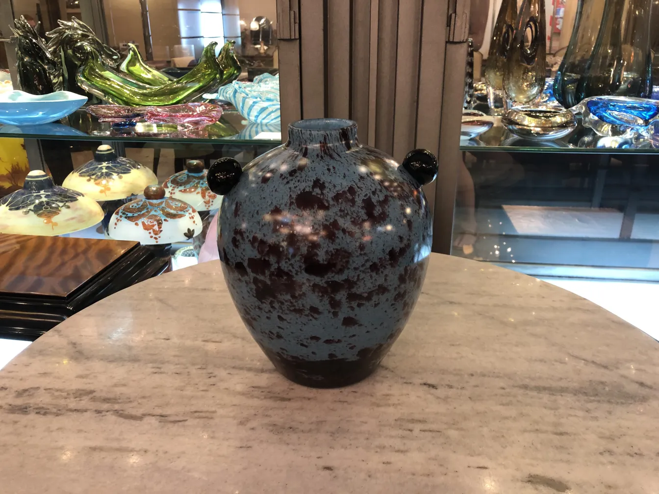 Blue decorative glass jar with spots, antique style.