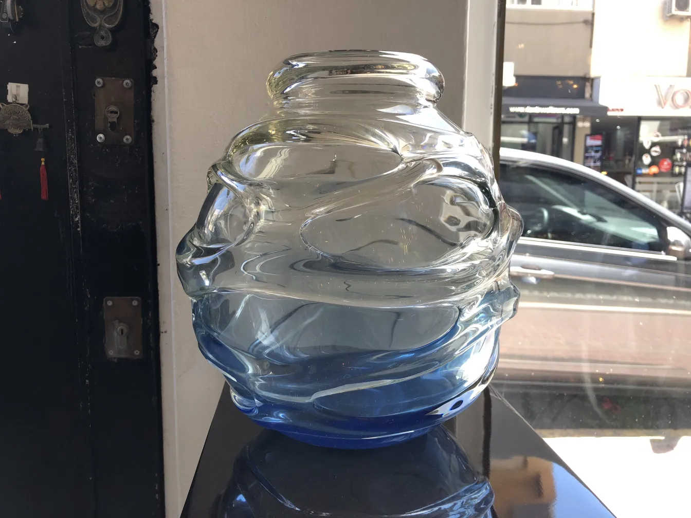 blue spiral-shaped glass, signed, antique schneider, displayed
