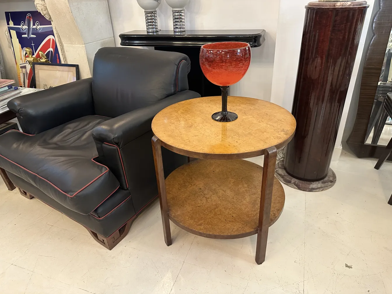 signed glass schneider on round table in modern setting