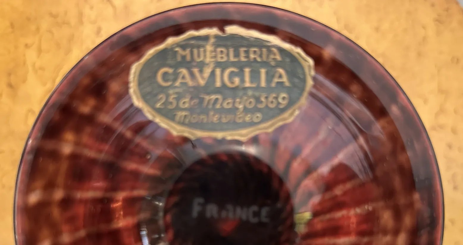 signed glass by schneider with decorative background