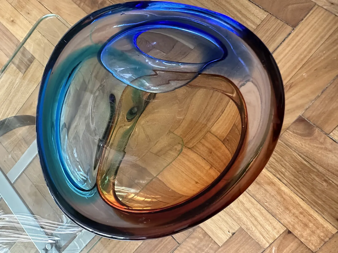 beautiful murano glass with blue and copper tones in abstract shape