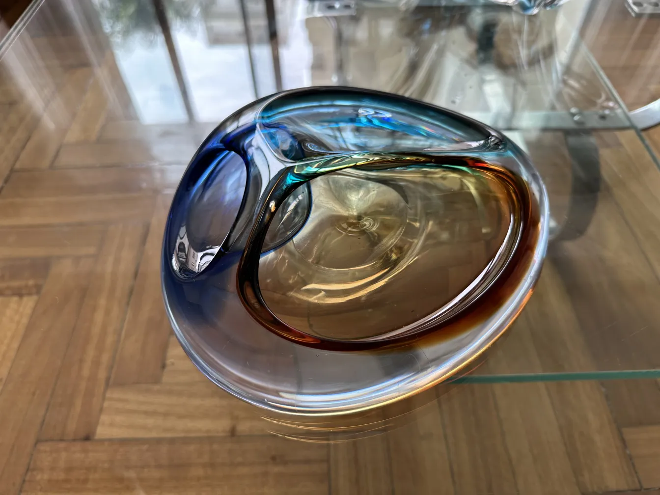 Antique Murano glass in vibrant colors on a table