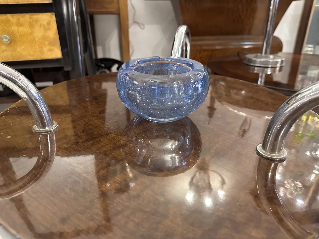 small blue murano glass bowl on table