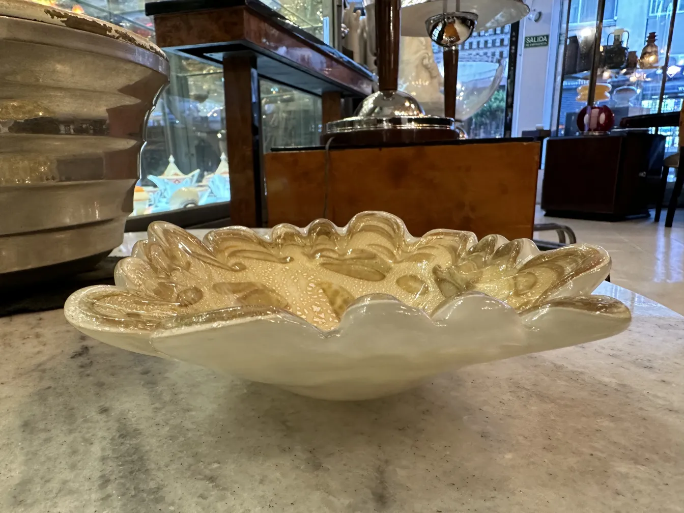 antique murano glass bowl with light tones and elegant details