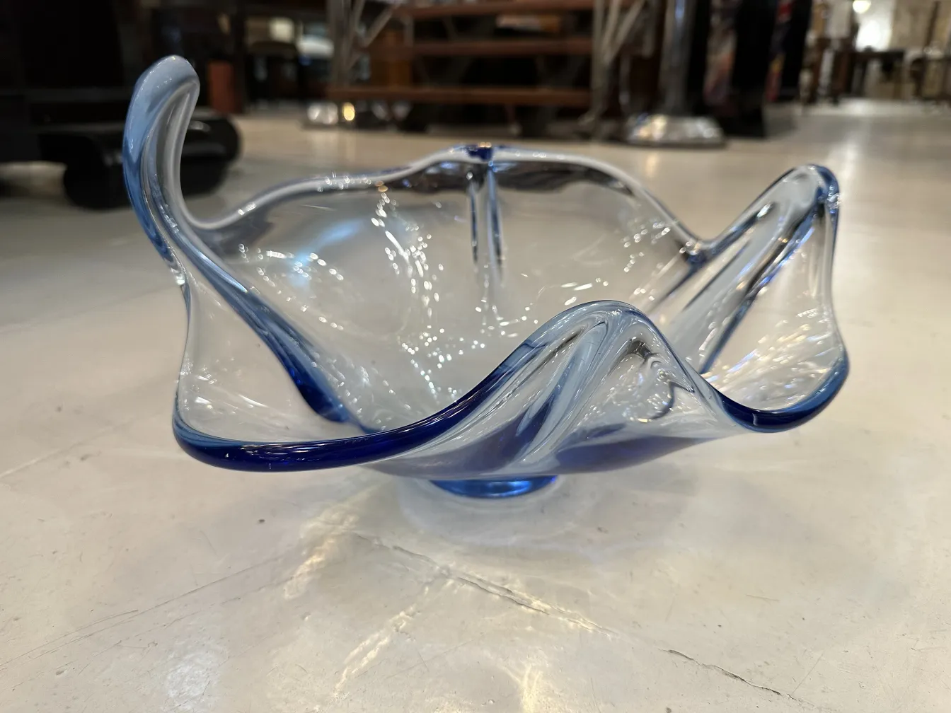 murano glass bowl with wavy shape and blue accents