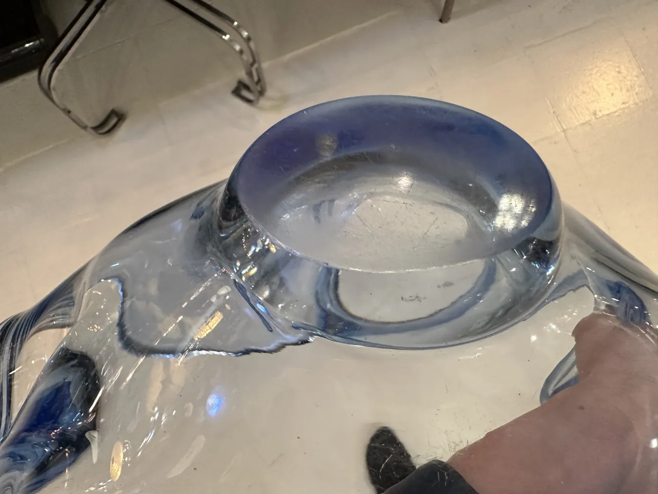 Decorative Murano glass with blue accents and ethereal design