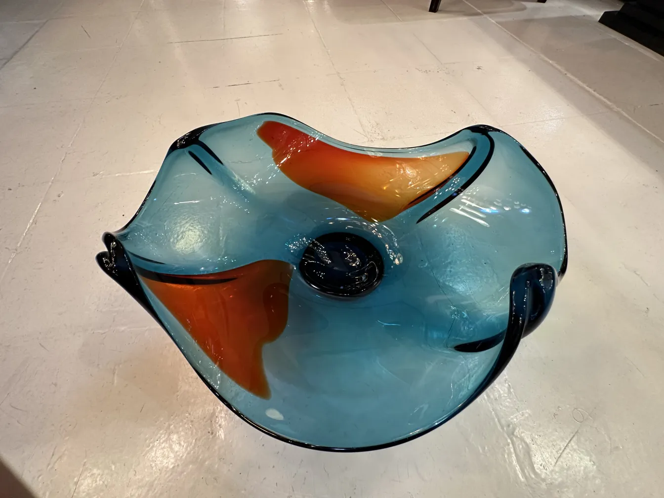 Antique Murano glass bowl in blue and orange hues