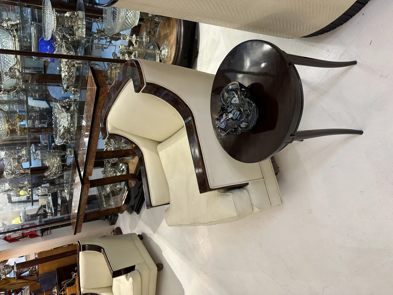 Antique Murano glass on a dark round table