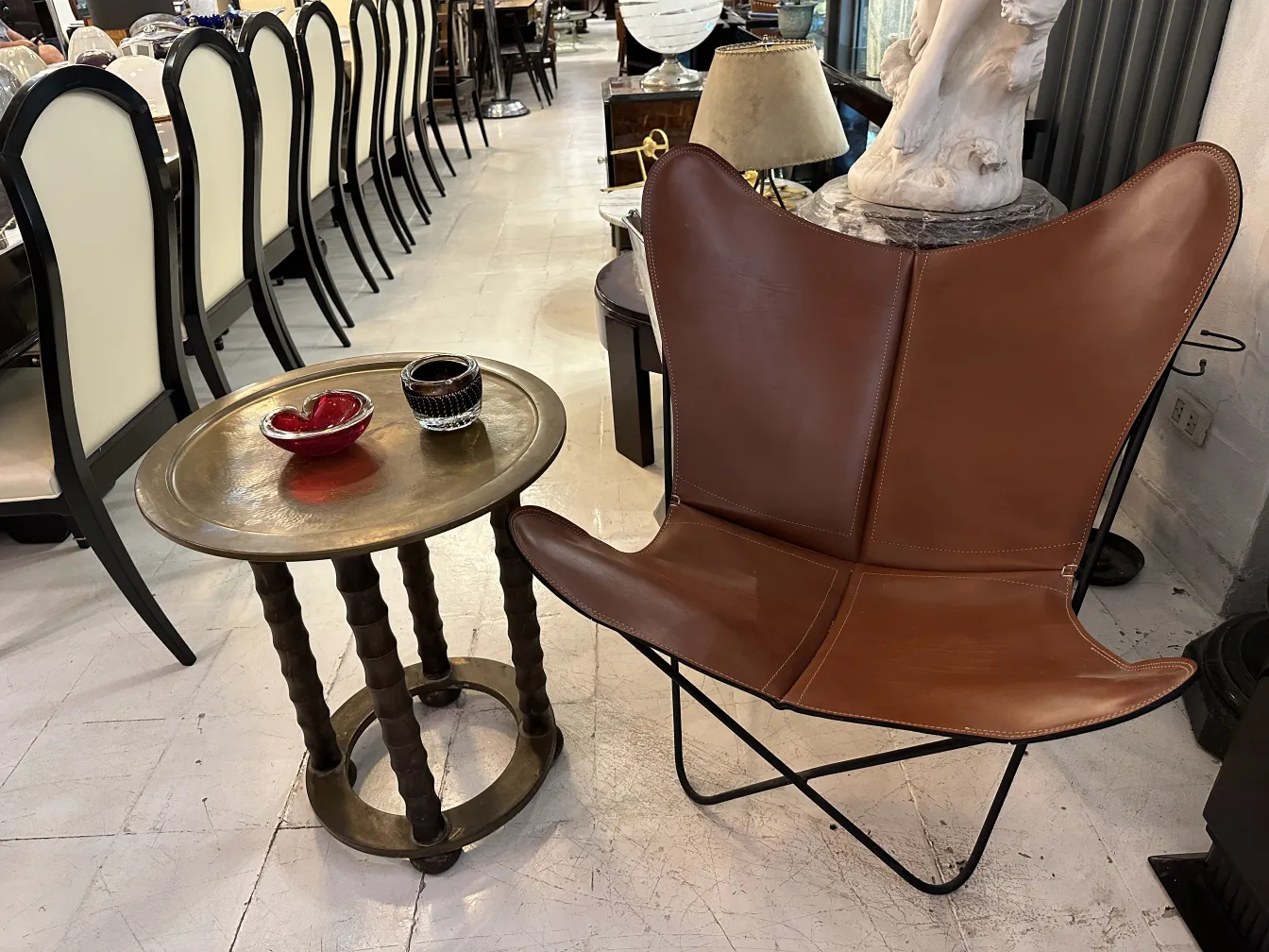 bronze table with decorations and murano glass