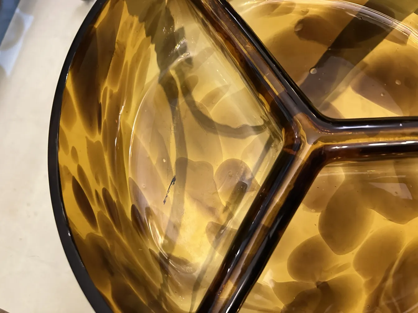 Antique Murano glass with amber tones and unique design