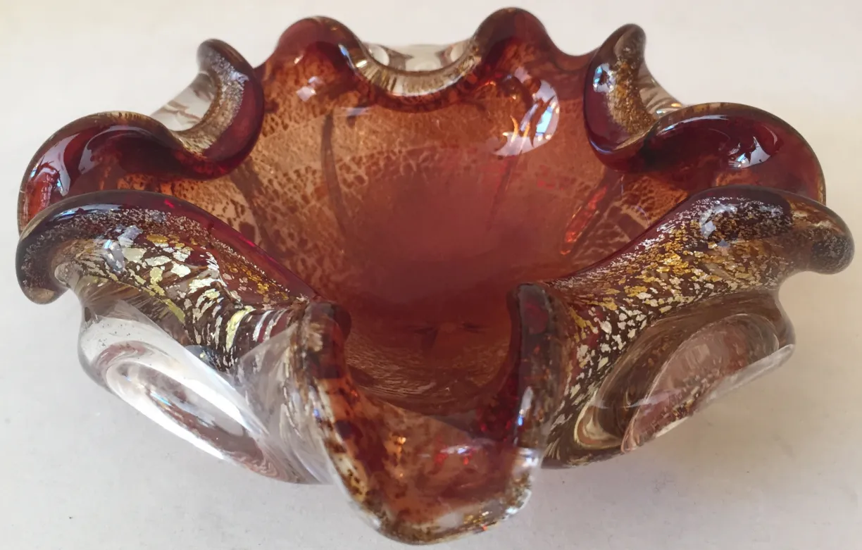 antique bowl of murano glass in warm tones