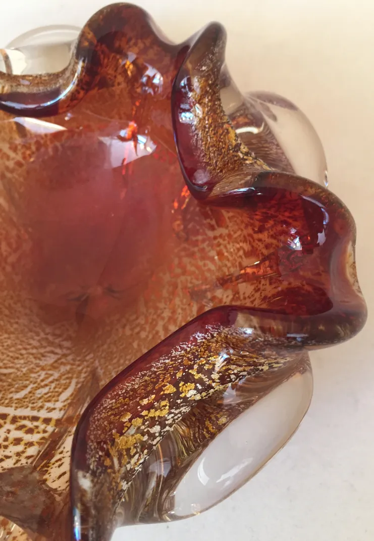 beautiful antique murano glass with wavy shape and warm colors