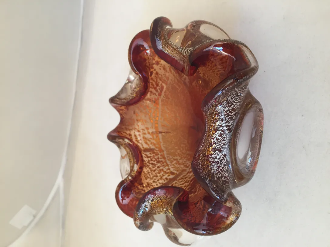 antique murano glass bowl with wavy design in brown and gold tones