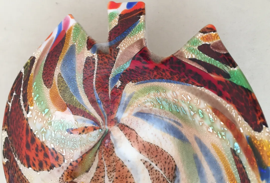 antique murano glass decorative with vibrant colors and unique shapes