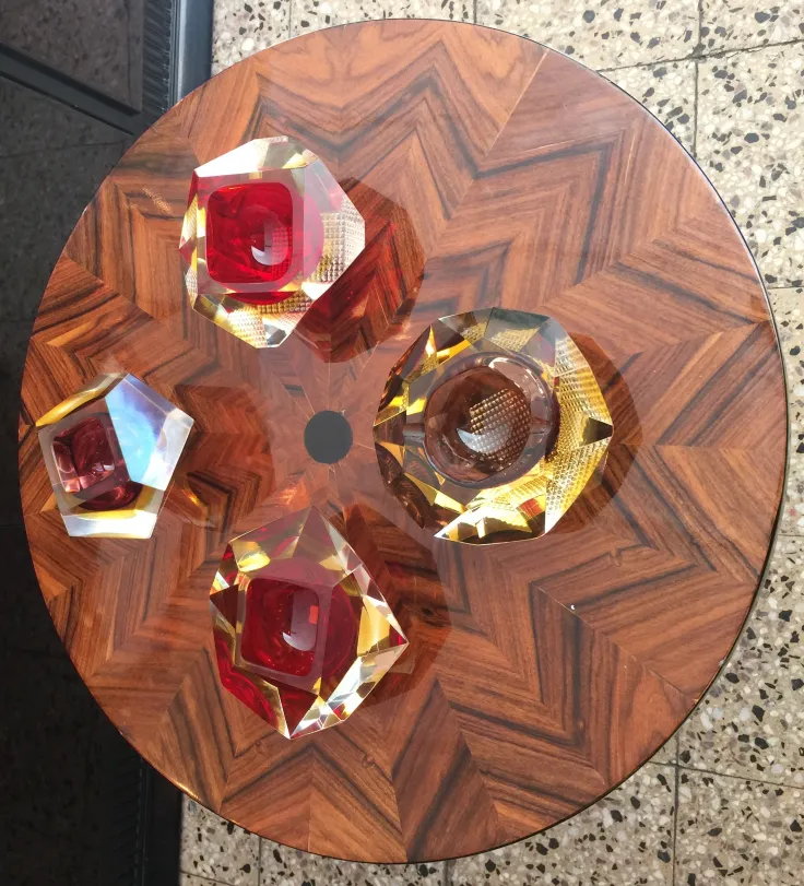 four antique Murano glass figures on the table