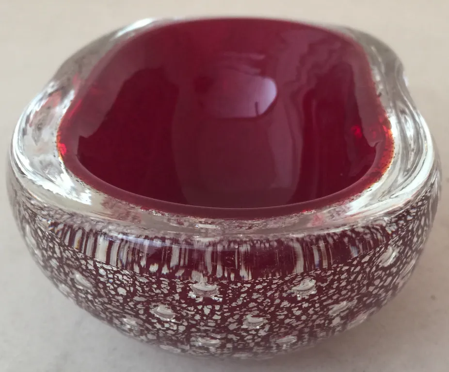 antique murano glass piece, red and white tones, distinctive design