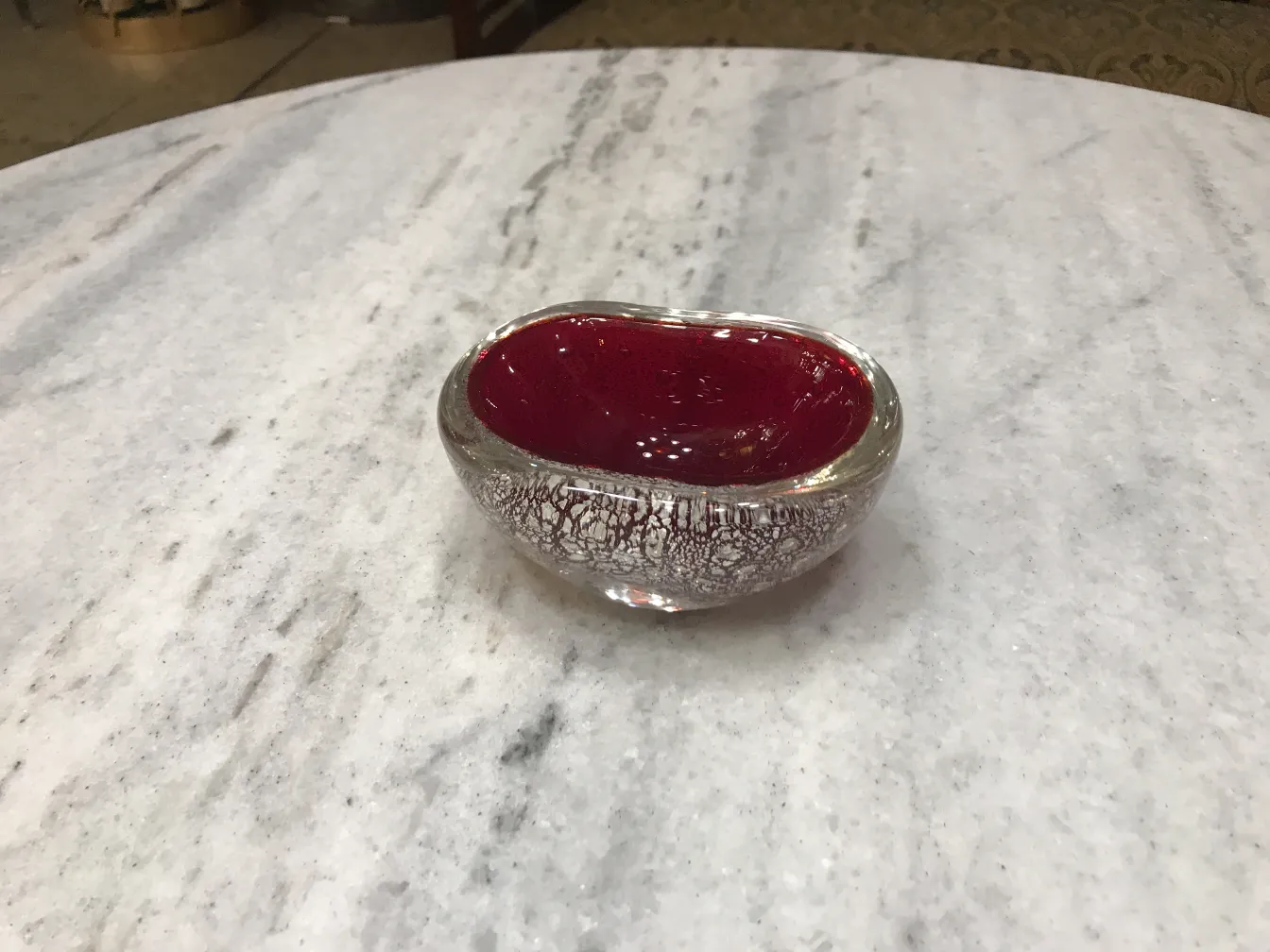 murano glass bowl with red interior, elegantly designed