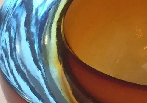 detail of antique murano glass with colorful patterns
