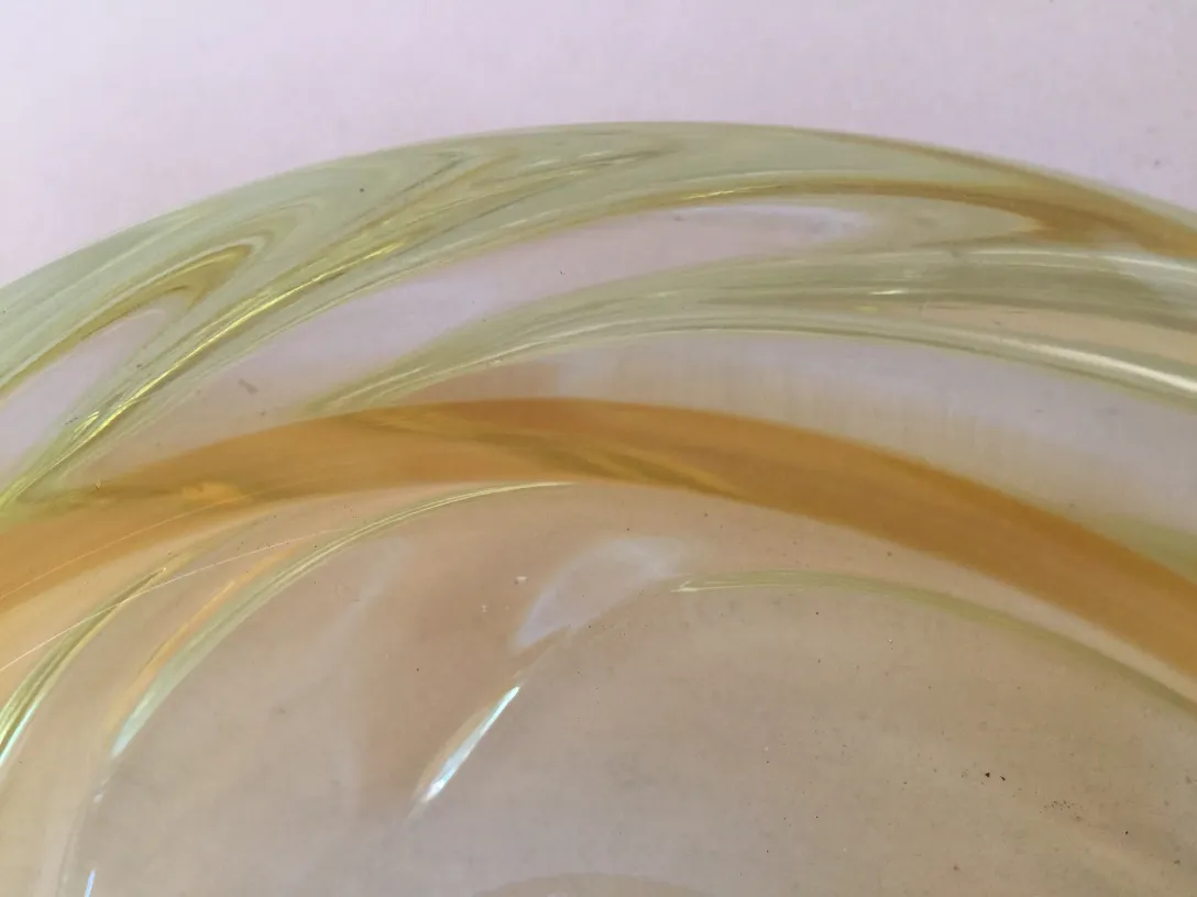 Antique Murano glass in yellow with flowing lines