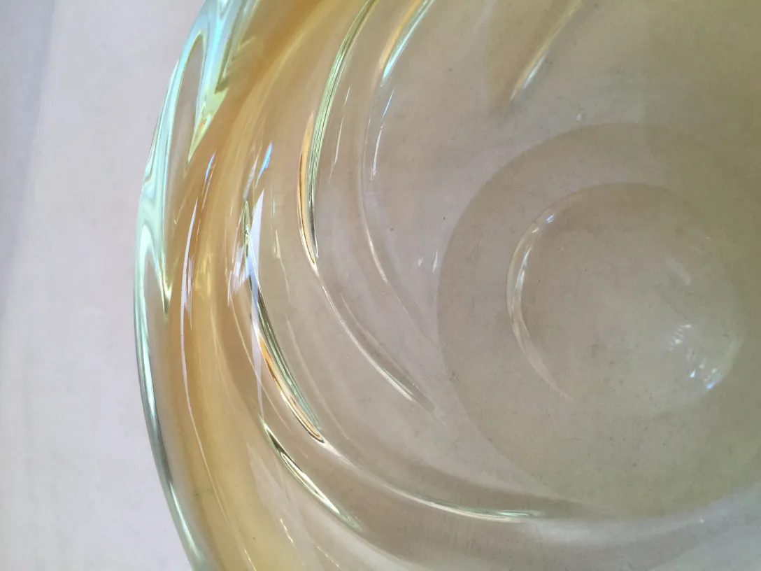 murano glass bowl with wavy shapes and light color
