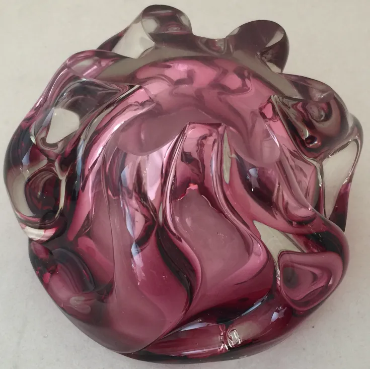 Antique Murano glass with fluid shapes and colorful design
